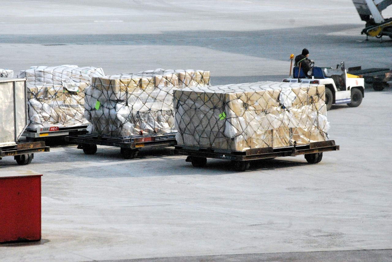 Air cargo pallets being transported for aircraft loading – JERTRANS